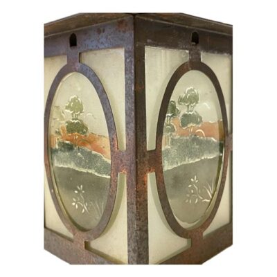 Oriental lantern style light shade c1920s. Orient inspired Art Deco light shade in glass and metal. The panels are of frosted glass with identical coloured image to the central area of a rural scene at sunset. There are some very minor signs of wear consistent with age. The gap for light at top of shade is 30mm in diameter. The top widest area of shade is 130mm square. Eye level close up of the 2 panels shown in the main photo.