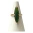 10 karat gold and jade ring. Vintage ring with a long eye shaped jade set in 10 karat gold. Jade size 26mm long and 6mm at widest. 10k hallmark to inside band. Ring size O / 7. Main photo of ring displayed on a cone shaped stand with the ring front facing forward.