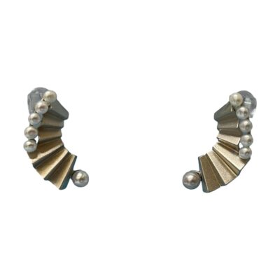 Sterling silver earrings with Madama Akoya pearls. Beautiful fan like sterling silver earrings each set with 5 small pearls at the top outer curve and one larger pearl to the end. The industrial look finish of the silver compliments the pale grey hue of the pearls perfectly. Hallmarked S925 to the back. Drop length approximately 30mm and 10mm at widest. Main photo of the earrings displayed on a stand. and seen forward facing. The small pearls are in a row along the outer curve of the silver fan shape and the larger single pearl is at the end of the fan.