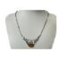 Sterling silver necklace with amber. Art Nouveau style sterling silver necklace with foliate design front with a single piece of amber to finish. Attached fetter and twist chain compliments the look. Hallmarked 925 to the back of amber and to the clasp. Necklace front measures 65mm wide at the top and hangs 45mm long. The amber measures 18mm by 12mm. Main photo of necklace displayed on a stand and seen front facing forward.