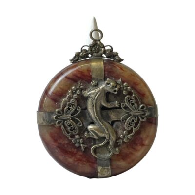 Antique Chinese large agate totem. A large disc agate with white metal banding decorated on both sides with an ascending big cat, possibly an Asian golden cat, a symbol of good luck & prosperity with a butterfly to its left and right which are symbols of longevity. The disc itself is a totem to ward off evil as well as a good luck symbol for wealth and prosperity. Possibly given as a gift for new home or business and would have had a red silk ribbon to hang it. Weighs 82 grams. Main photo showing one side of the totem only (both sides are the same decoration) The totem is shown upright with the ring for the ribbon at the top with a small flower with leaves below. The big cat is at the centre with a butterfly on its left and right. The agate is a striped marbled red with a whole in the centre which is barely visible because of the white metal band on both sides in a plus formation.