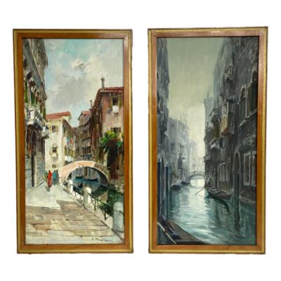 Pair of Venice oils on canvas. Vintage oils by Corrado Padovani depicting 2 varying aspects of Venice life. One with a sunny bright scene and a small group of people by a small arched foot bridge and the other a misty canal scene of a gondolier. Both absolutely stunning and life like. Very hard to look away from! Main photo of both oils shown side by side with the sunny scene on the left and misty canal scene to the right. The oils have identical wooden frames. The contrast in colours is incredible. One is bright and sunny, other is grey and misty but both oils are absolutely stunning with incredible detail.