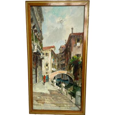 Pair of Venice oils on canvas. Vintage oils by Corrado Padovani depicting 2 varying aspects of Venice life. One with a sunny bright scene and a small group of people by a small arched foot bridge and the other a misty canal scene of a gondolier. Both absolutely stunning and life like. Very hard to look away from! Photo of the sunny scene oil only including frame in the shot.