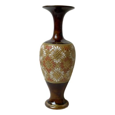 Royal Doulton china gilt vase. Antique Royal Doulton Slater patent vase in an unusual red and white colouring china gilt ware c1900. The decoration gives a firework or chrysanthemum effect. Full makers stamp to the base. In very good condition throughout. Measures 70mm in diameter at base, approximately 90mm at widest and 85mm across the top. Main photo showing the vase from an eye level angle. Rich brown glaze to the top and bottom with the red and white decoration around the central bulbous area of the vase. The neck and mouth has a fluted design.