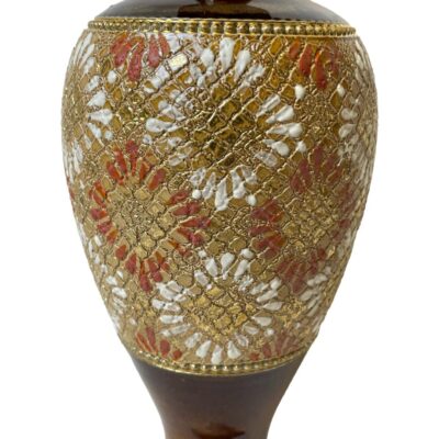 Royal Doulton china gilt vase. Antique Royal Doulton Slater patent vase in an unusual red and white colouring china gilt ware c1900. The decoration gives a firework or chrysanthemum effect. Full makers stamp to the base. In very good condition throughout. Measures 70mm in diameter at base, approximately 90mm at widest and 85mm across the top. Close up photo of the red, white and gilt decoration.