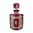 Vintage Val St Lambert bottle with stopper. Beautifully cut crystal bottle in clear and cranberry glass with the clear glass areas all dimpled. Lovely dressing table piece or for storing some special tipple! Signed to the base with original sticky label attached at top. Made in Belgium. Main photo of bottle with stopper in place seen from an eye level angle with cranberry crystal glass segment in the foreground and clear crystal either side.