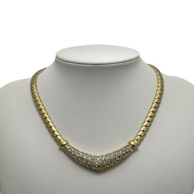 Vintage Dior collar necklace with crystals. 1980s gold plated thick snake chain necklace with a crystal encrusted front by Christian Dior. Signed to the clasp and back of the crystals. In excellent condition. Slightly adjustable in length from 360mm to 400mm. Main photo of necklace displayed on a stand and seen forward facing. The crystal area is the main part of the necklace and is a wide U shape enhanced with the thick snake chain.
