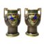 Pair of small 2 handled Noritake vases. Lovely pair of small hand painted Noritake vases with phoenix in flight from the Phoenix & Dragon collection c1890-1921. Greek key design to the handles in gilt and around the rim in green. Both vases in good condition with only minimal gilt wear throughout. Each measures approximately 80mm in diameter at base, 60mm across the mouth. Very slight size difference between the two. Main photo of the two vases displayed side by side from an eye level. The Greek key handles are to either side of each vase and the phoenixes in the triangular panel are facing in towards each other. The base colour of the vases are brown with red, green, yellow and blue decorations and finished with gilt to handles, around base and mouth.