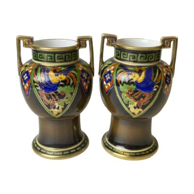 Pair of small 2 handled Noritake vases. Lovely pair of small hand painted Noritake vases with phoenix in flight from the Phoenix & Dragon collection c1890-1921. Greek key design to the handles in gilt and around the rim in green. Both vases in good condition with only minimal gilt wear throughout. Each measures approximately 80mm in diameter at base, 60mm across the mouth. Very slight size difference between the two. Photo of both vases shown side by side and from a slightly raised angle showing a fraction of the white interior.