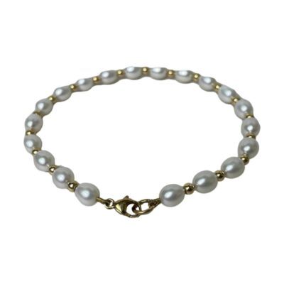 Handmade pearl necklace with attached silver pendant. Vintage choker style necklace of freshwater pearls with silver dividers and an attached beautifully worked silver pendant. Egyptian hallmark to back of pendant. Pendant drop length 58mm and width 39mm. Photo of bracelet with the clasp closed. The bracelet is laid out in a circle and the clasp is in the foreground.