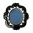Main photo of locket seen with the pin side to the back. The Whitby jet is carved into an intricate frame with the swivel locket set on a pin at the top and bottom. The locket can only swivel when the pin is opened so the pin side picture is the one closest to the heart!