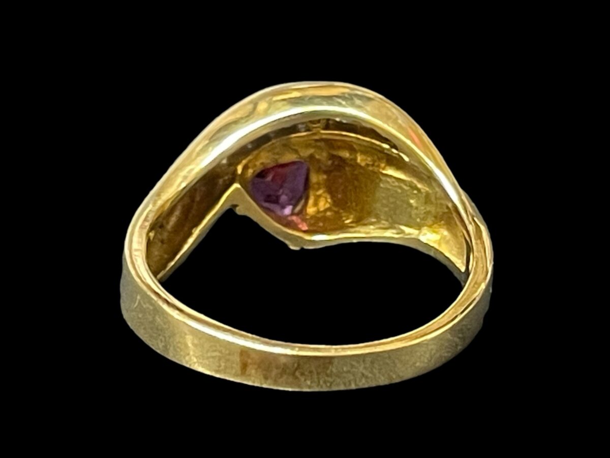 Photo of ring seen from the back and showing area where stones are set.