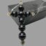 Main photo of cross leaning left vertically upright against a block of black marble. The 5 vertical agate beads have the white line going across horizontally whilst the 2 beads making the cross piece show the white band vertically.