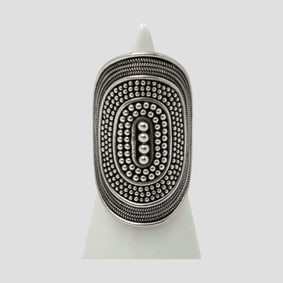Main photo of ring displayed on a cone shaped stand and facing forward. The ring is so large and long that most of the cone display stand is obscured! If you are after a statement ring, this ticks all the boxes.