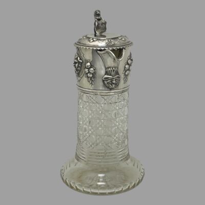 Photo of jug seen from an eye level and from the front with spout slightly to the right of centre.