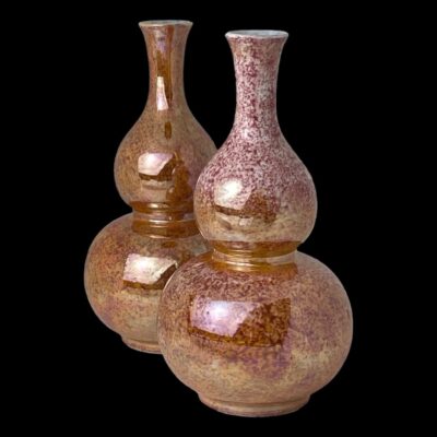 Photo of the 2 vases in the same position as main photo with the orchid flowers removed and seen in close up from an eye level.