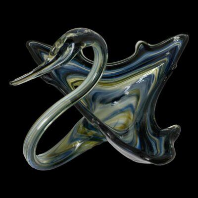 Photo of swan facing same direction as main photo and from a raised angle looking diagonally down to show the inside of the bowl.