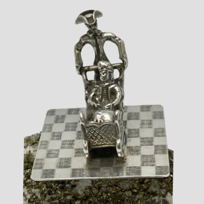Photo of miniature looking straight on.