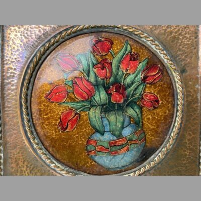 Close up photo of the tulips in the vase. The disc with the art work needs straightening up as slightly on the skew.