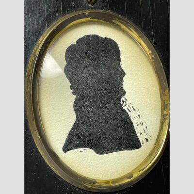 Close up photo of the male portrait. The ILT signature is on the bottom left.