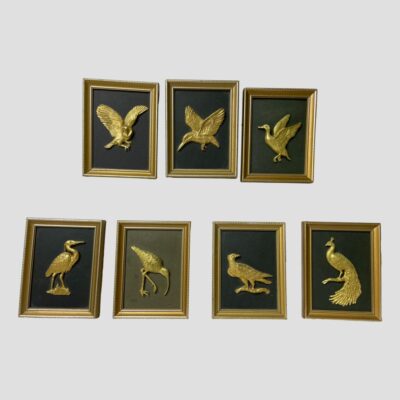 Main photo of all 7 miniature pictures on display. The 3 birds in flight are in a row at the top (L to R owl, kingfisher and duck) and the remaining 4 are below (L to R heron, long-billed curlew, eagle on a perch and peacock)