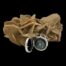 Main photo of compass shown open and standing upright on its own in front of a rock of natural desert sand rose.